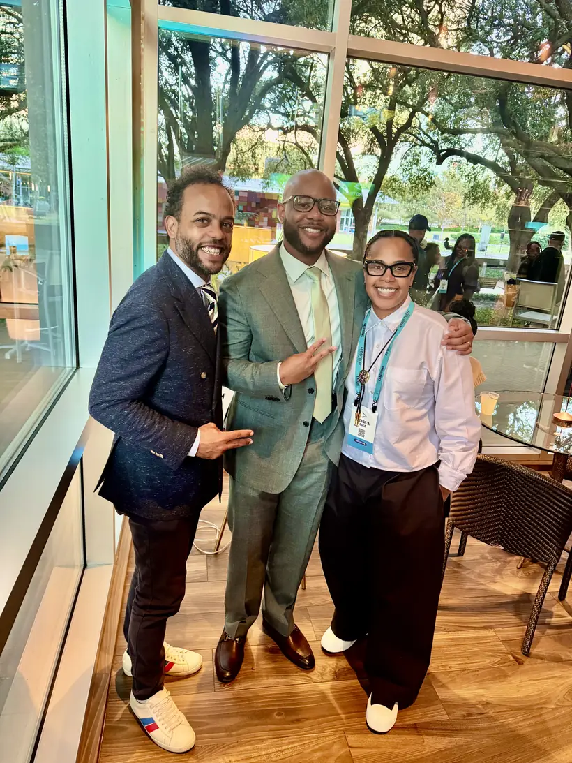 Anthony Duncan with friends at AfroTech